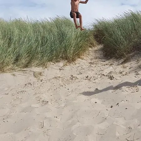 Noordzeehuisje Nyaraló *